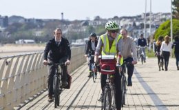 Commuters on foot and bike in Swansea, Wales