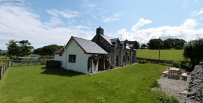 Set within its own large, scenic and tranquil garden in Snowdonia