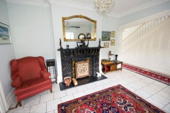The hall was knocked through into a reception room